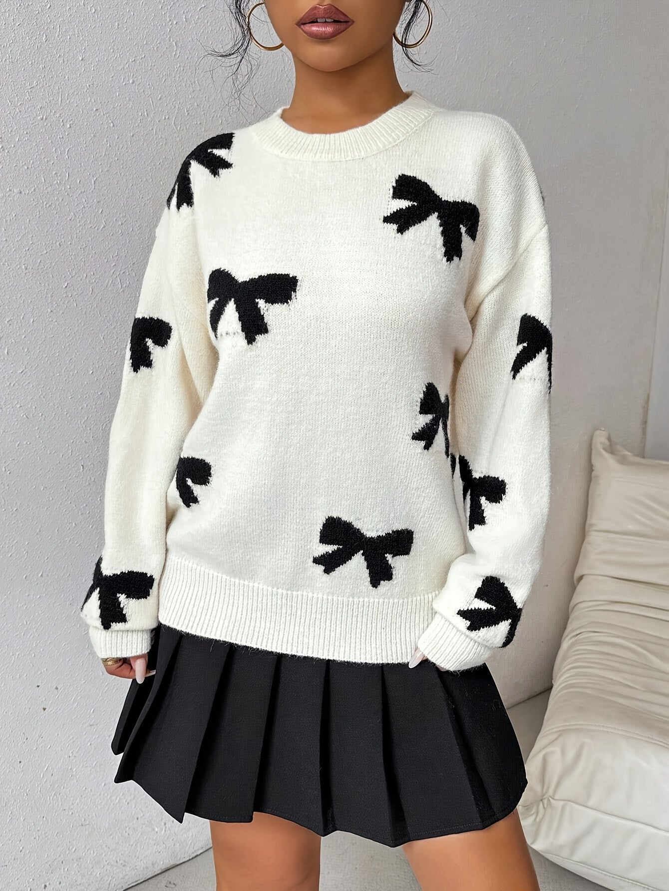 LUNORT | KNITTED JUMPER WITH BOWS